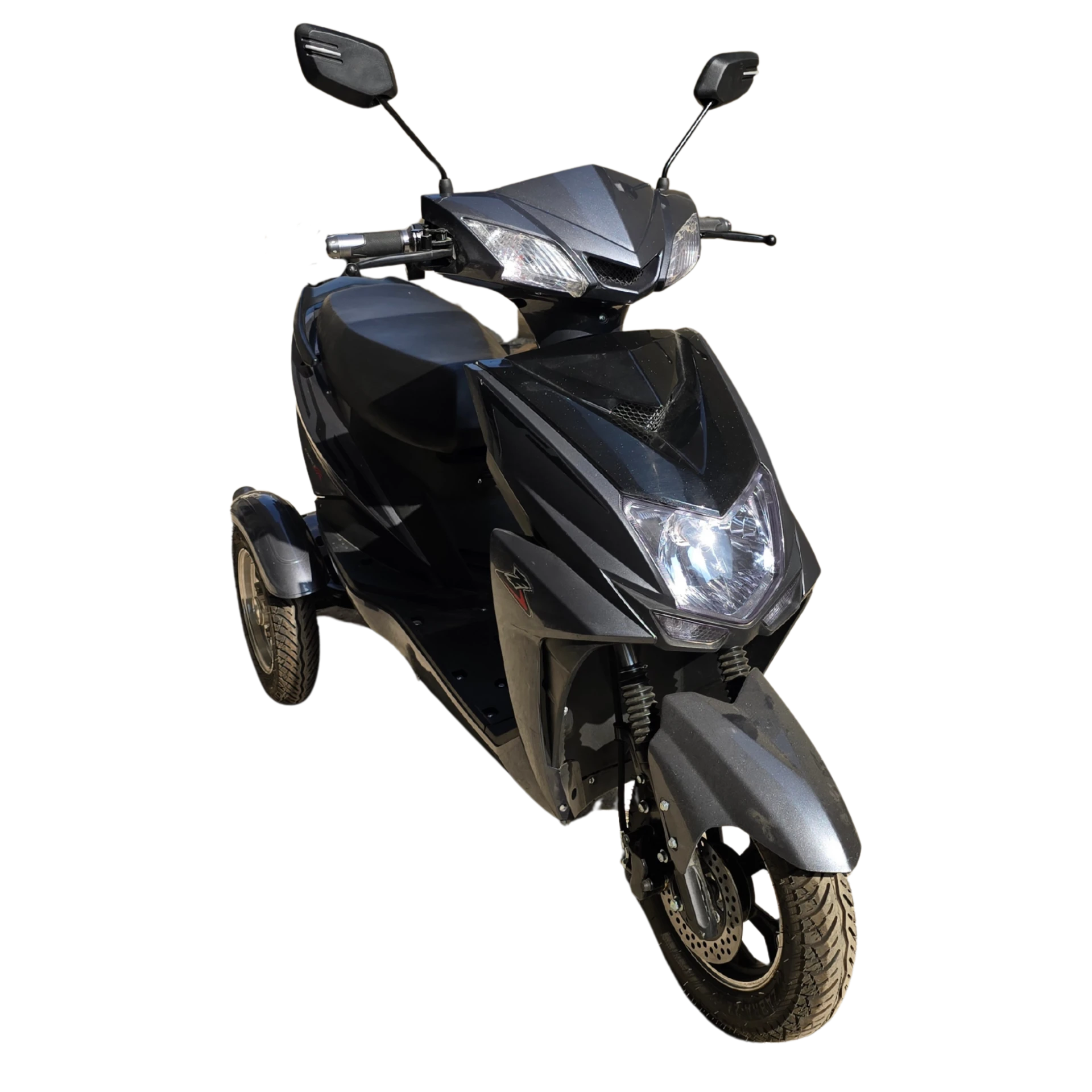 eOxigen Handicap Single Light three-wheeler electric scooter, front three-quarter view with headlamp on